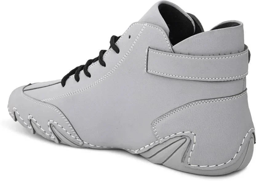 Gray high-top athletic shoe with black laces, unique stitching details, PK footwear