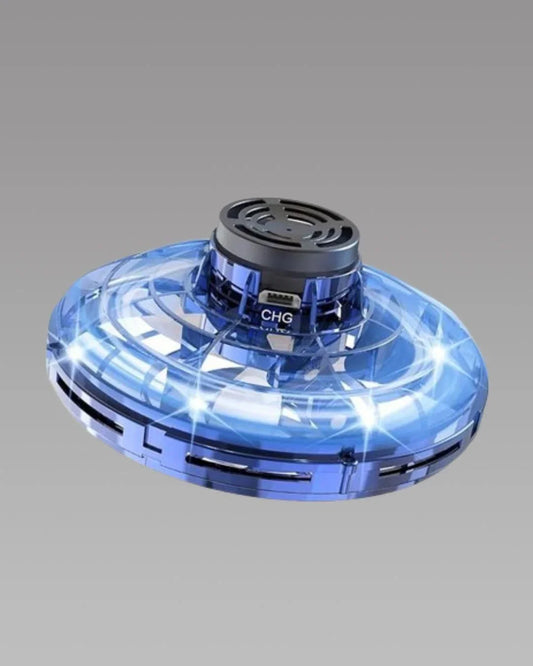 Transparent blue flying toy drone with USB charging port on a grey background